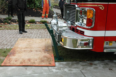 three collapsible by apparatus bumper force bollards with a fire truck knocking into them