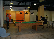 GSA's Public Buildings Service (PBS) workplace renovation incorporates a space for relaxation that includes a pool table