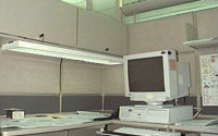 Photo of an office cubicle with task lighting