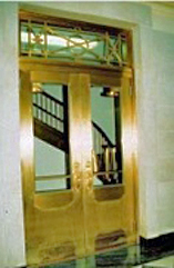 closed stair doors retrofitted with rated glass for fire and smoke separation