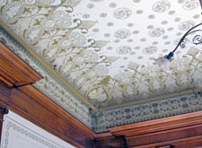 Sympathetic installation of fire suppression system at decorative ceiling