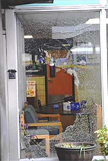 Close-up of window adjacent to entrance door at Sandy Hook School