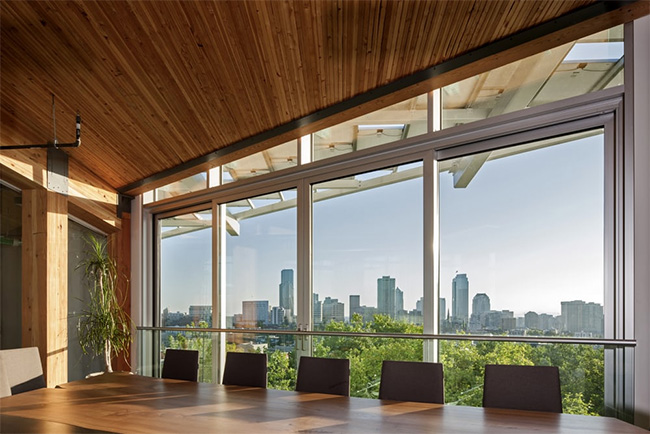 Wall of windows on the interior of the Bullitt Center showing off the view