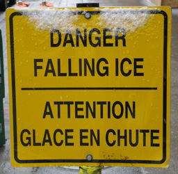 Yellow danger sign stating-Danger Falling Ice