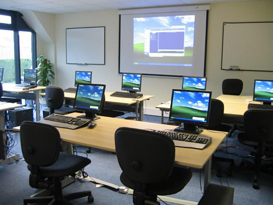 A photo displaying the space in a training room with individual learning stations.