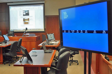 Using overhead screens and electronics in a courtroom