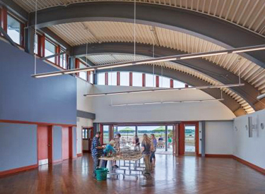 The Brock Environmental Center's conference room. The south wall opens onto the deck