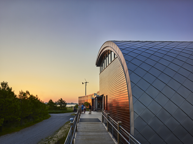 The exterior of the Brock Environmental Center featuring zinc shingles and sinker-cypress siding