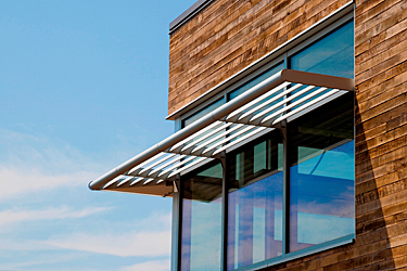 Horizontal shading device wrapped around the facade of the Center for Sustainable Landscapes, Pittsburgh, PA