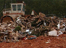 Large pile of debris at a construction and dmolition landfill cell