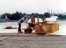 SPF roof being installed with a robotic sprayer