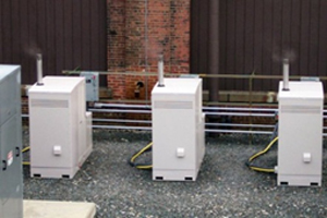 Photo of three plug power polymer electrolyte membrane fuel cells at the Watervliet Arsenal, Department of Defense, Army.