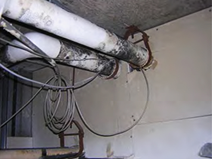 photo of ceiling piping showing mold growth from hot humid air infiltration