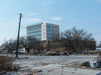 Building still standing in a neighborhood destroyed by Hurricane Katrina