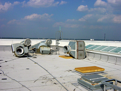Dislodged/damaged rooftop HVAC equipment post-Hurricane Katrina