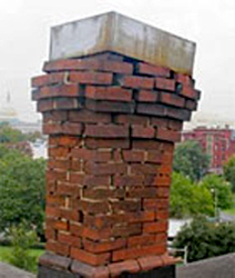 chimney with deteriorated mortar joints showing vibration damage after an earthquake