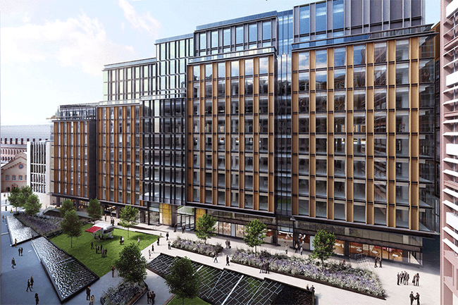 exterior photograph of a large building along the water known as Lon 6 Pancras Square in London