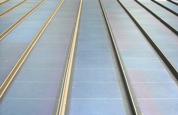 Thin-film collectors on a standing-seam metal roof