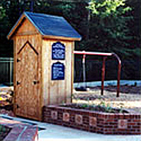 Playground Storage Zone with a tall narrow lockable storage unit