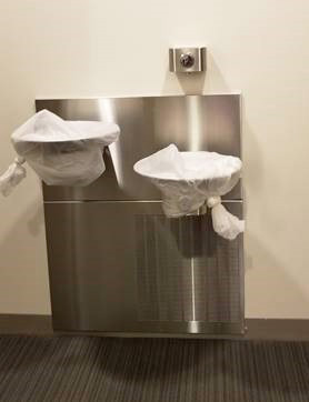 Office water fountains covered to restrict use due to COVID-19