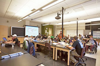 Students sitting and working at tabletops in the biology lab at Winona State University