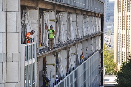 New glass façade of the Secretariat office tower being installed.