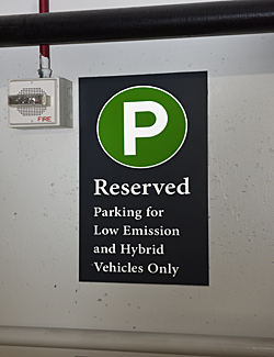 parking sign in garage for low emission vehicles